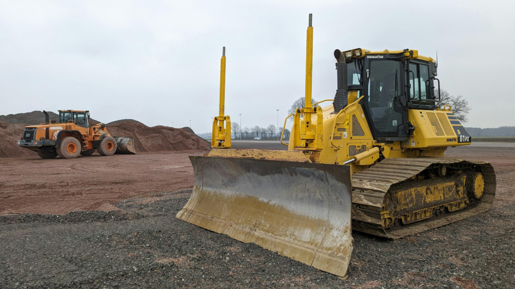 Skid steer loader at work